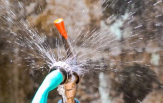 Water,Leaking,From,A,Hose,Tap